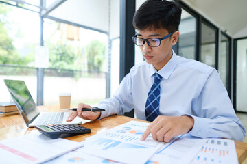 Businessman or accountant Calculating Investment, Risk, and Budget.