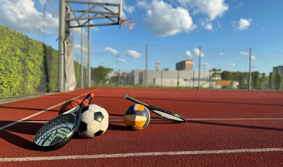 High Angle View Of Various Sport Equipments On playground