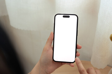 Hands holding a smartphone with blank white screen for application design