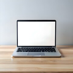 Clean and modern. this image showcases a laptop with a blank screen on a wooden desk.