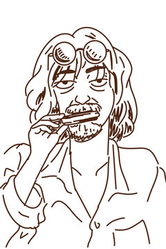 Long-haired man wearing glasses on his forehead playing harmonica