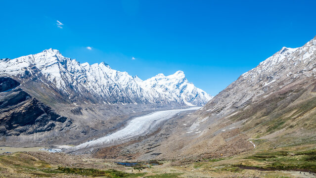 Drang Drung Glacier is a mountain glacier that is visible from the Pensi La mountain pass on the Kargil Zanskar Road.