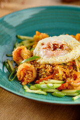 Delicious Shrimp Fried Rice with Egg on Colorful Plate