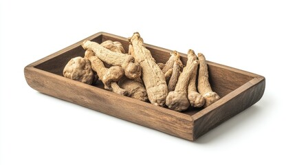 Wooden tray displaying ginseng roots and Ganoderma mushrooms with a white background and window shadow.