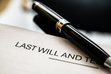 Last Will and Testament Document with Elegant Fountain Pen On Table for Estate Planning and Legal Preparation