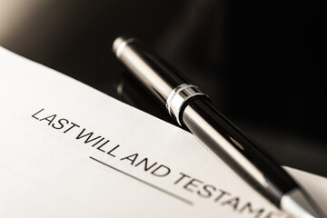 Formal Last Will and Testament Document Close-Up with Luxurious Pen: Essential Legal Paperwork for...