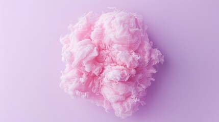 Fluffy cotton candies on colorful background