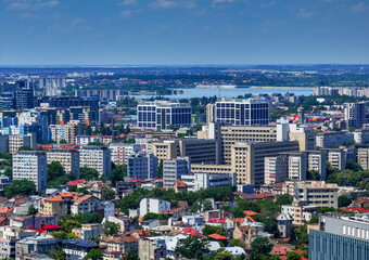 Bucharest from above. Aerial view over Bucharest skyline with modern office corporate buildings in background. Travel to Bucharest, view the office business side of the city.