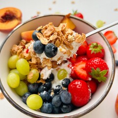 Bowl of Granola with Fresh Berry and Coconut Yogurt