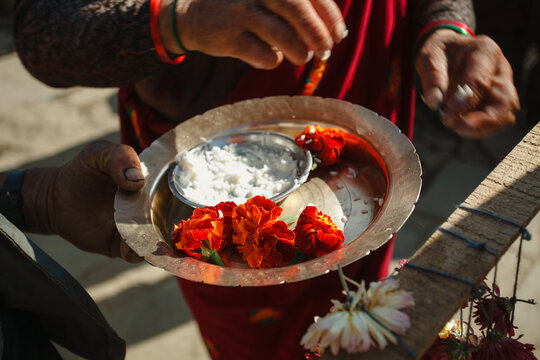 Offering Flowers and Rice in Nepal