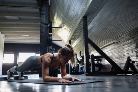Female practising in a gym