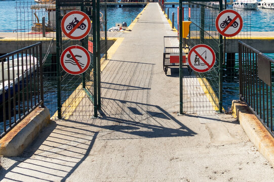 No entry signs on a pier