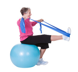 Senior Woman using Stretching Equipment for Therapy on White Background,