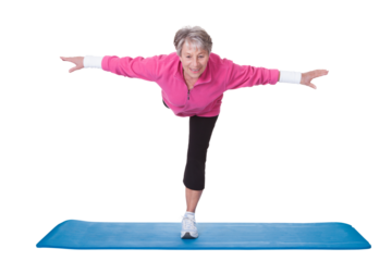 Balance and Strength: Senior Woman Practices Yoga Pose on White Mat