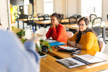 WOMAN IN A COMPANY GIVING A SALES SUMMARY