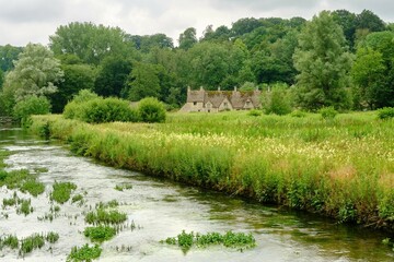 View across River Coln and Rack Isle water meadow to the picture