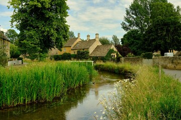 Traditional English stone cottages along the picturesque River E