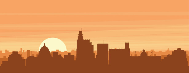 Fototapeta premium Brown panoramic poster of the city skyline with misty background buildings, sunrise, clouds and mountains of JACKSON, UNITED STATES