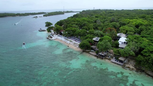 Cinematic aerial View of the beautiful Bora Bora island Beach and Resort in Cartagena.