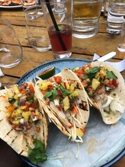 chicken with vegetables taco on patio