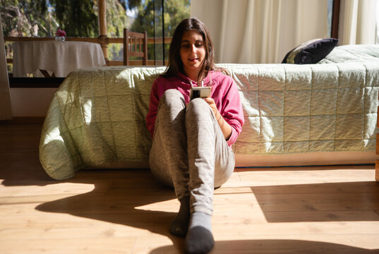 happy woman enjoying her free time at home 