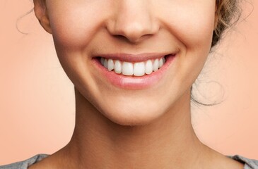 Fototapeta premium Young smiling happy person posing on background