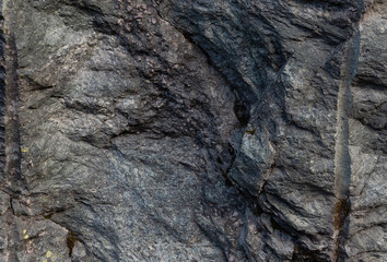 Rugged Textured Rock Surface with Geological Patterns. Gray Rock texture. Rock layers