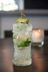 Tiki Cucumber gin Drink on table 