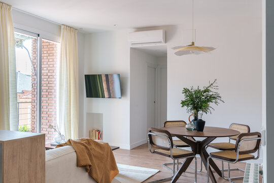 Modern living and dining area with a light, airy feel