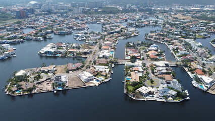 The canals of Lecheria Anzoategui in Venezuela and its incredible houses where the richest people live and their boats