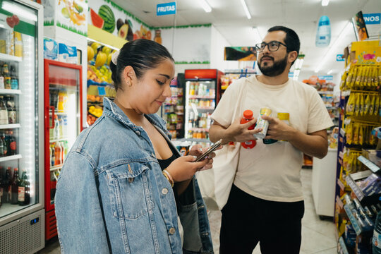 Friends Shopping in Grocery Store