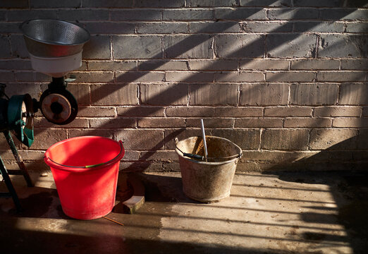 Close-up of a bucket in an old rural house