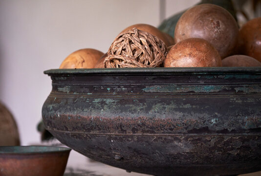 Closeup of old decorative objects on a table indoors
