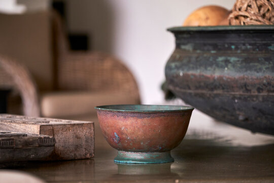 Closeup of old decorative objects on a table indoors