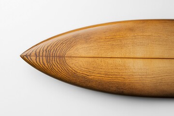 Beautifully crafted wooden surfboard displaying intricate grain patterns, copy space for text, surt concept
