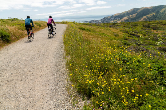 Two cyclist riding together in nature
