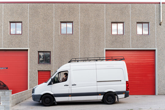 Delivery man working with his van