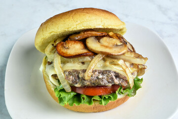 hamburger  top with  onions and  mushrooms