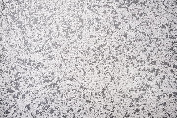 background wall is decorated with gray decorative blots