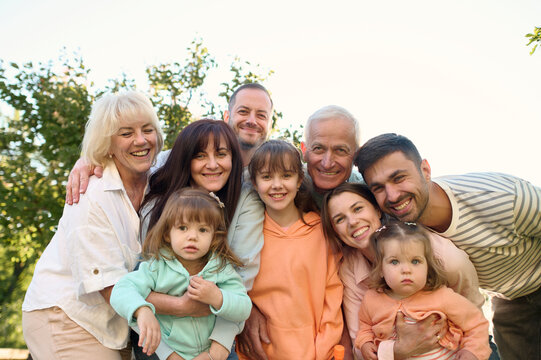 Portrait of a family of several generations in the garden 