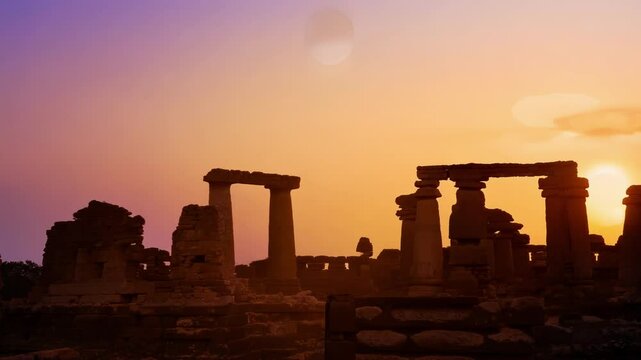 Majestic ancient greek temple ruins stand against a vibrant sunset, casting long shadows and creating a mystical and evocative fantasy atmosphere