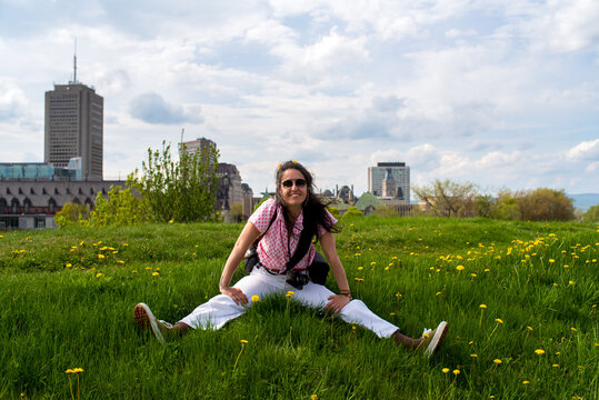 Quebec City tourist portrait sitting in Plains of Abraham