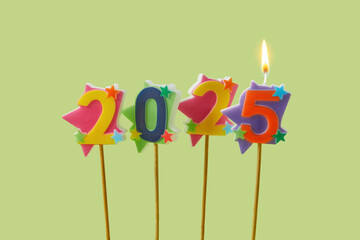 Festive candles for new year party decoration on olive background