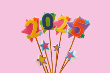 Cake topers with colourful stars and numbers for new year celebrating