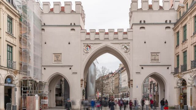 Karlstor in the old town of Munich timelapse with unidentified people walking on the street. The Karlstor is the western city gate of the historic old town. Entrance to Kaufingerstrasse. Germany
