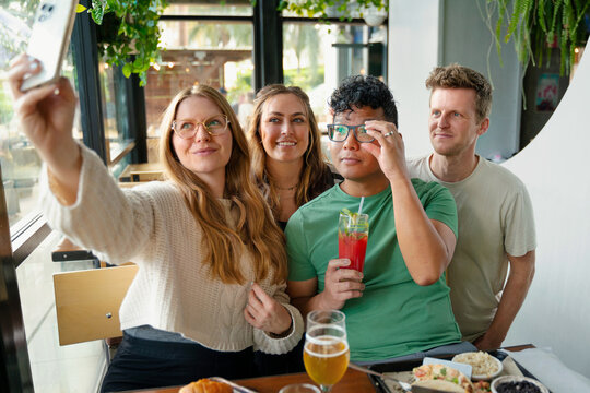 Friend Group Takes Selfie  - Powered by Adobe