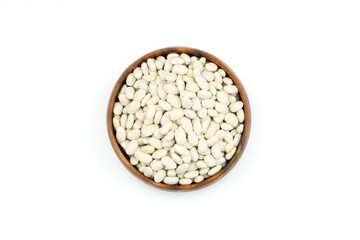 white kidney bean in wooden bowl isolated on white background. Top view. Flat lay