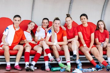 Women's Football Team on Bench