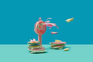 Compact ventilator surrounded by coloured stickers and paper plane