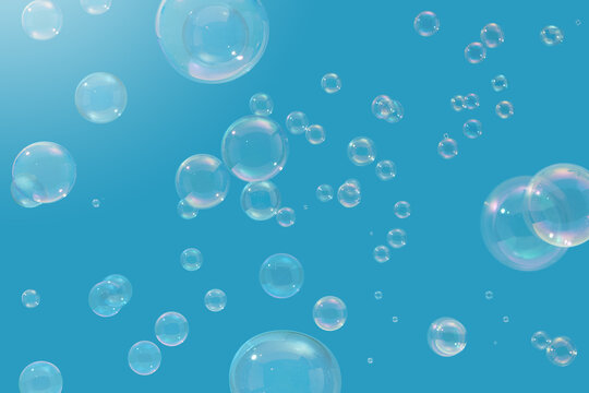 Air bubbles floating in studio and creating rainbow gradient